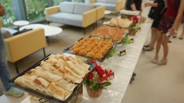 A fresh buffet spread with breads and hot dishes